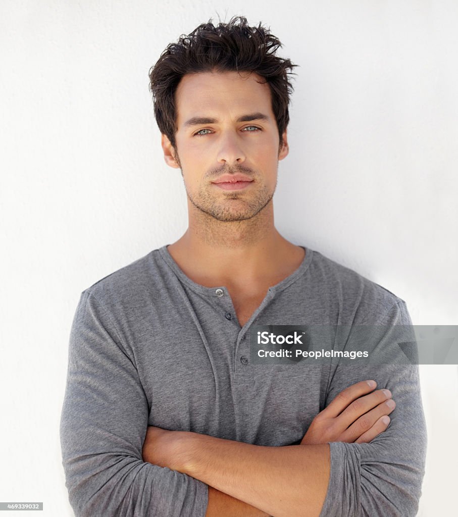 Fashion is a serious business Portrait of a handsome young man standing against a wall with his arms crossedhttp://195.154.178.81/DATA/i_collage/pi/shoots/785506.jpg Men Stock Photo