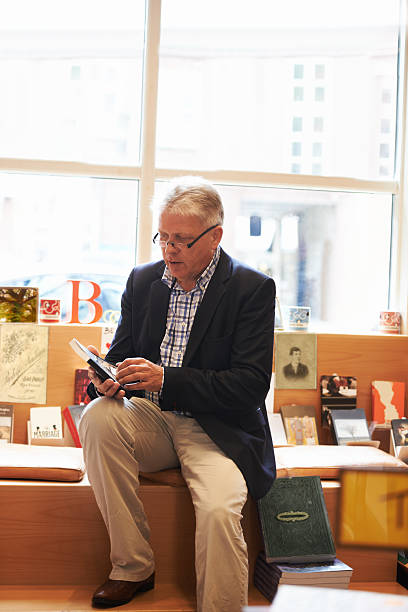 istock Spending his free time in his favorite bookshop 469339090