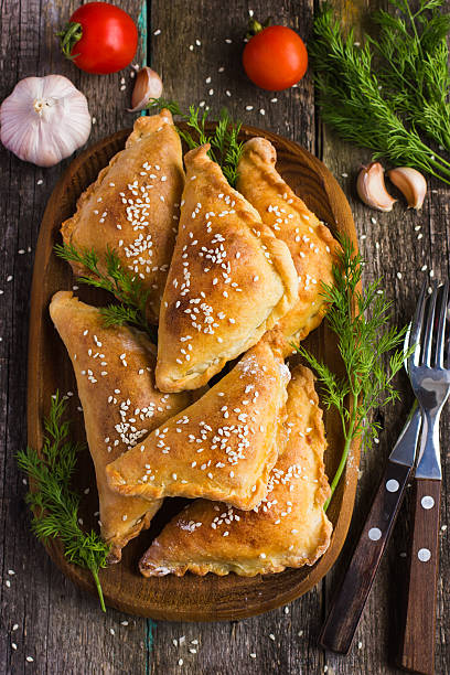 istock Fresh baked  pasties filled with meat and vegetable 469339670