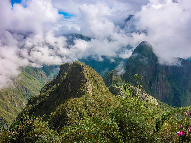 istock Huayna Pichu Mountain Cover by Clouds 469340228