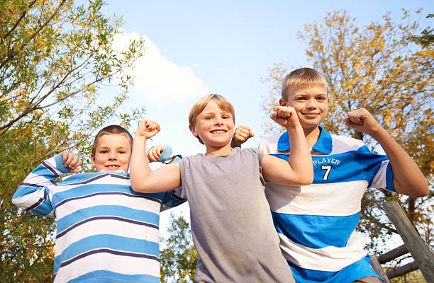 istock Building muscle by being kids 469344516