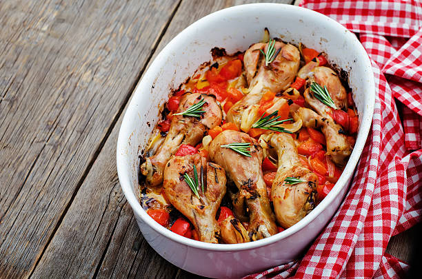 istock chicken baked with rosemary and vegetables 469345480