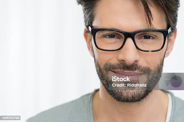 Satisfied Man With Spectacle Stock Photo - Download Image Now - Smug, Men, Eyeglasses