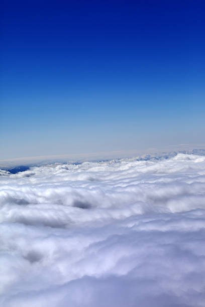 istock Mountains under clouds in sun winter day 469345794