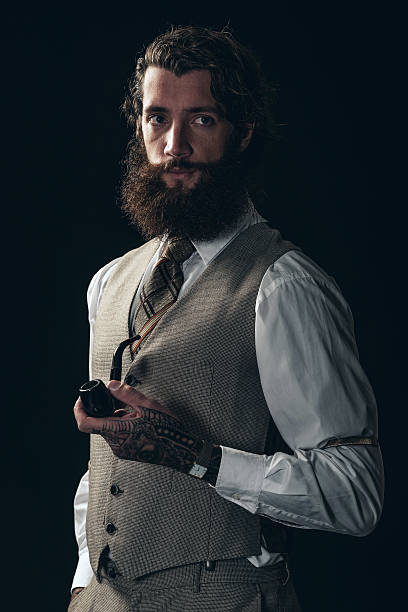 istock Serious handsome man in vintage dress 469346304