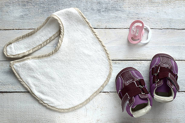 Baby stuff on white wood