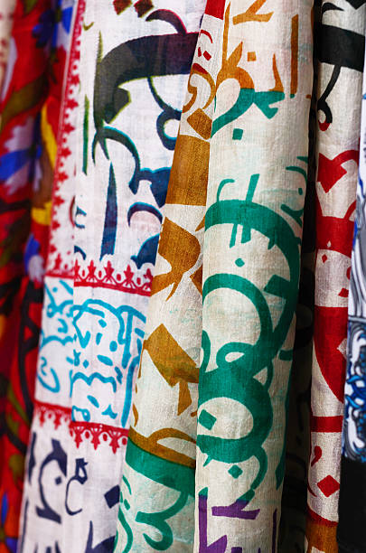istock Silk shawls hanging at the market 469347302