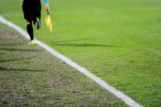 istock Assistant referee in action on a soccer field 469347686