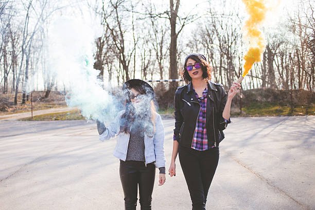 istock Two young girlfriends in sunglasses having fun 469347894