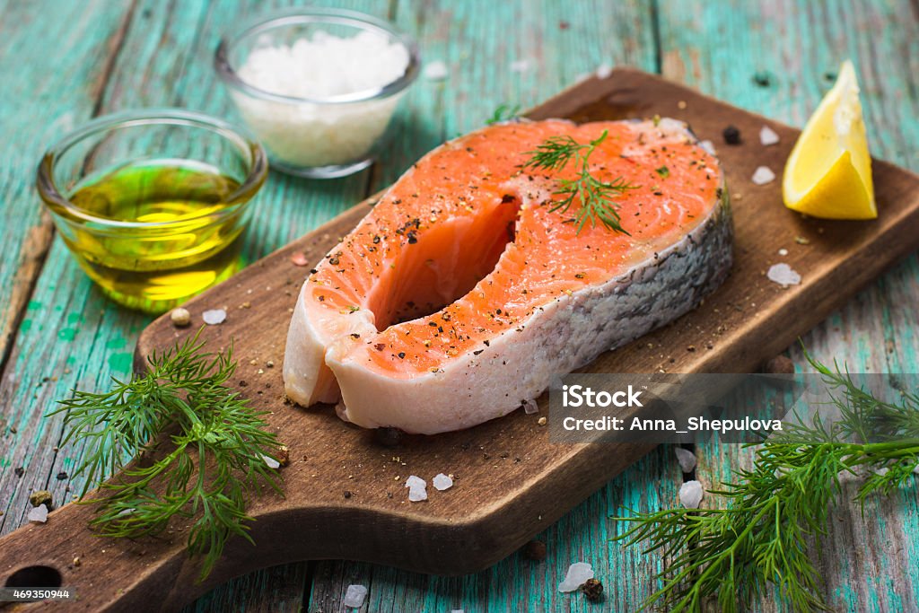 fresh raw salmon steak with herbs and spices 2015 Stock Photo