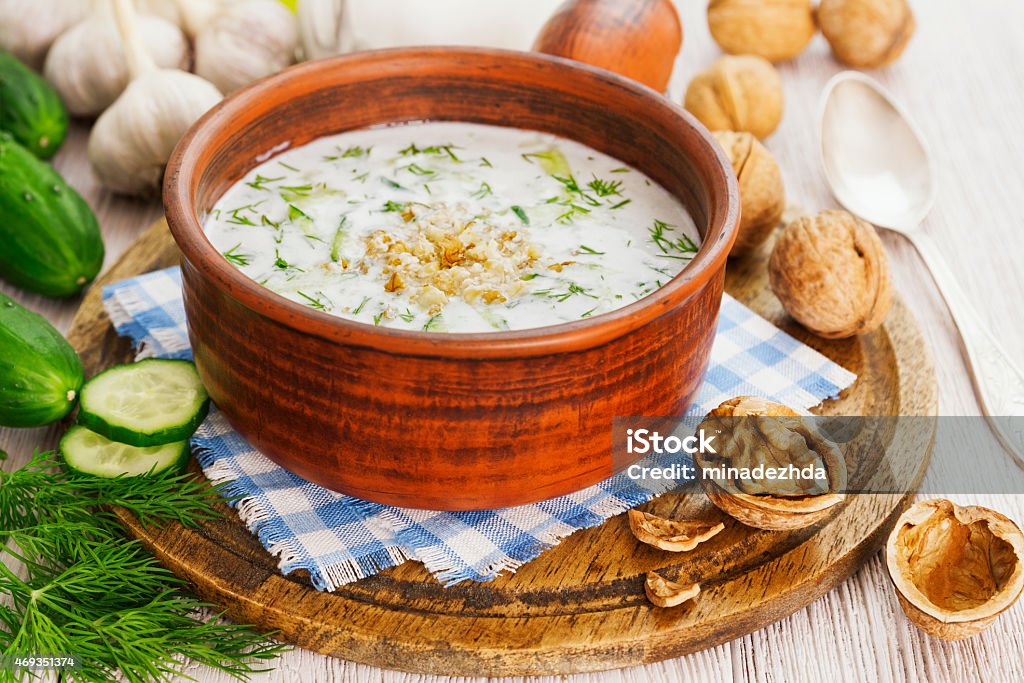 Tarator, bulgarian sour milk soup Tarator, bulgarian sour milk soup in an orange bowl 2015 Stock Photo