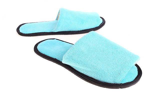 istock blue slippers footwear isolated on white background 469351622