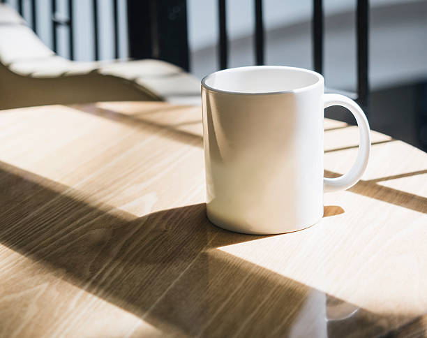 istock Mocked up Coffee cup on table in cafe 469351852