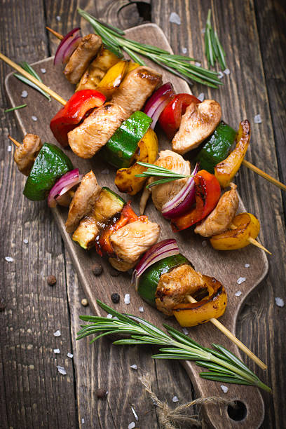 istock Grilled meat and vegetable kebabs 469352302