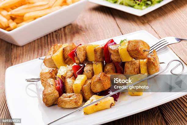 Grilled Chicken Skewers With Pineapple Peppers And Onions Serve Stock Photo - Download Image Now