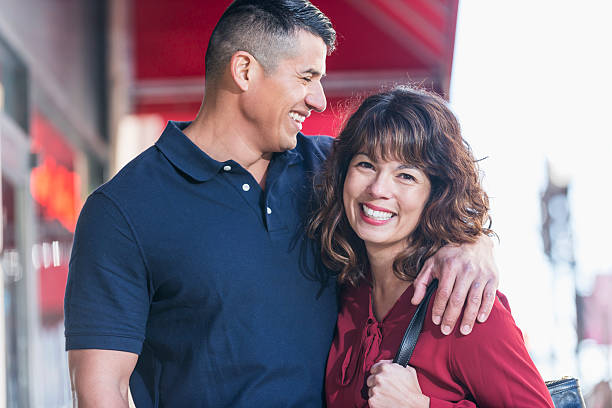 istock Multi-ethnic couple standing together outdoors 469356276