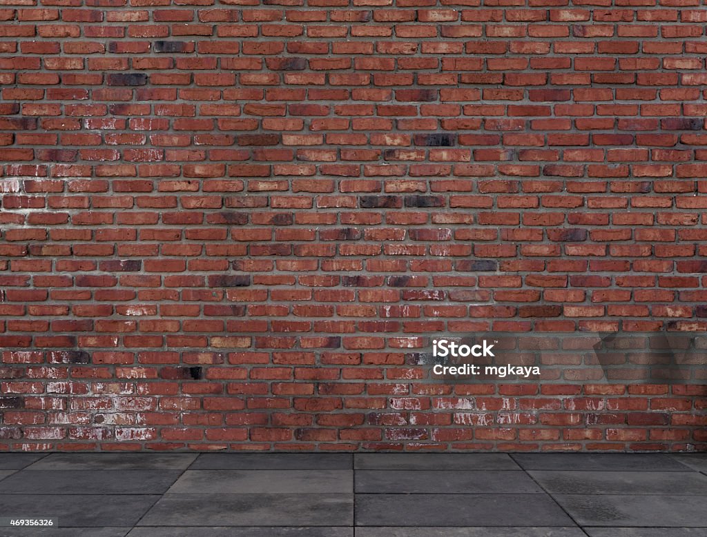 Brick Wall with Sidewalk Brick wall with sidewalk texture background image. Brick Wall Stock Photo