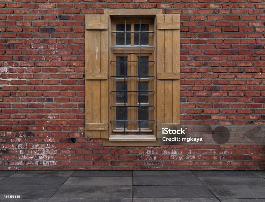 Old Window with Shutters Against a Brick Wall Old window with wooden exterior shutters against a brick wall with sidewalk. 2015 Stock Photo