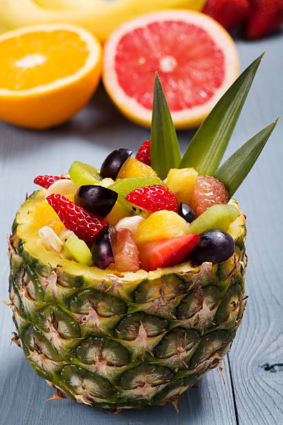 istock Fresh fruit salad served in bowls with fresh pineapple 469358924