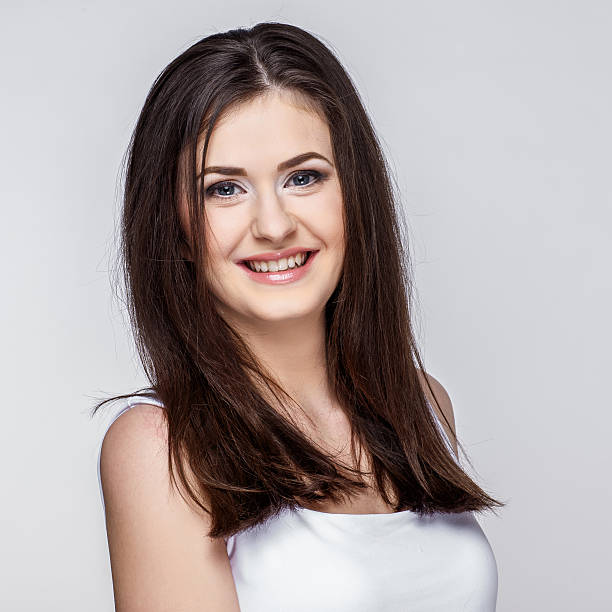 istock Young woman on grey background 469360438