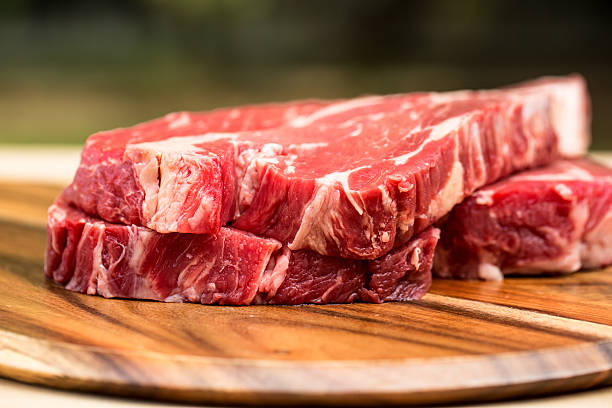 istock Fresh beef steaks on wooden board 469369732