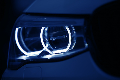 Detail on one of the LED headlights of a car.