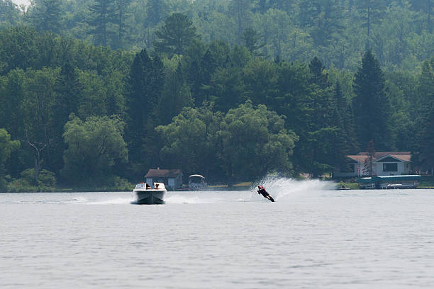 Mature man water skiing on Lake Champlain                   