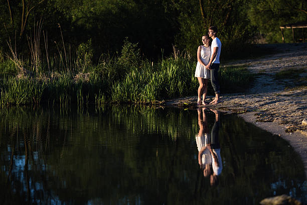 istock Couple and sunrise 469376302