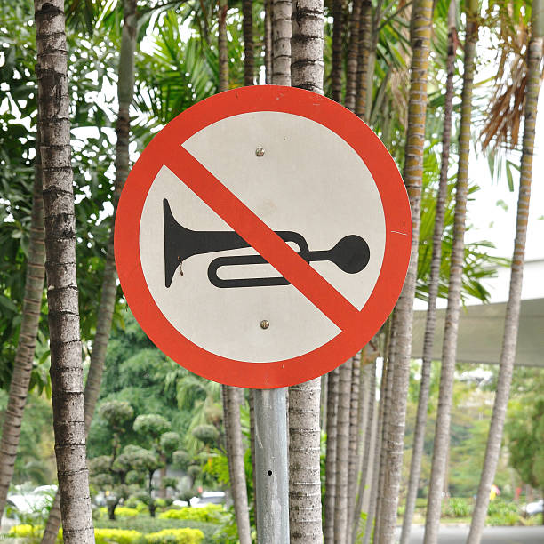 Do not use vehicles horn sign stick on tree.  Silence zoning.