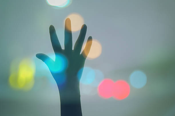 istock Raise one's hand Bokeh Background 469390084
