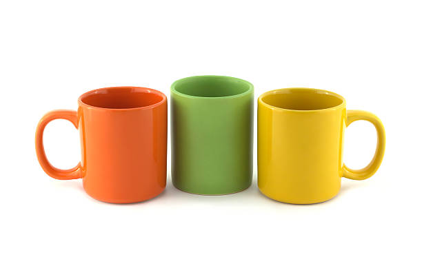 istock Three big color empty cups isolated on white close up 469391446