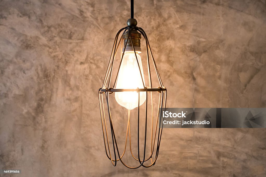 Lighting decor on cement wall Lighting decor on cement wall, warm light Antique Stock Photo