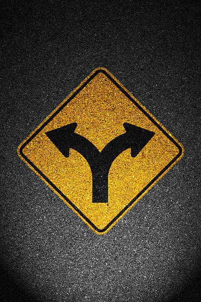 istock Arrows signpost on asphalt painted 469395120