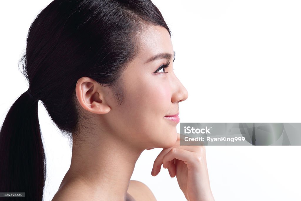 beautiful Skin care woman Face Beautiful Skin care woman Face isolated on white background. asian Beauty Profile View Stock Photo