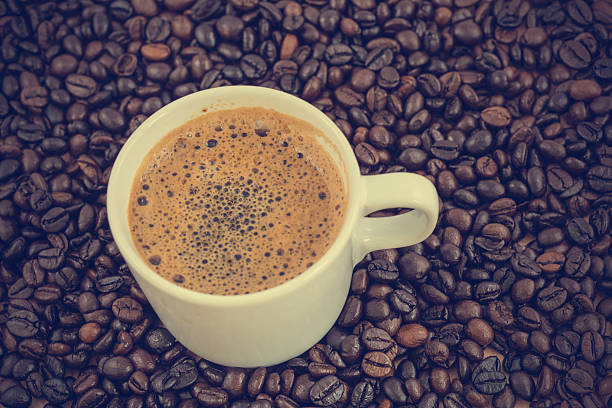 istock Coffee cup and beans - vintage effect style pictures 469395822