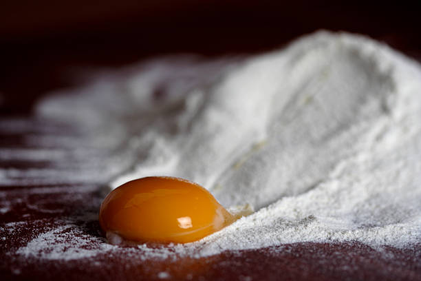 istock Close up of egg and flour 469396992