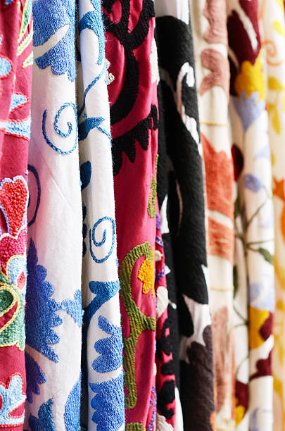 istock Traditional suzani embroidery panel hanging at oriental bazaar 469397522