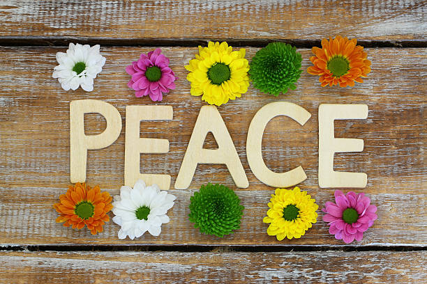 istock Peace written with wooden letters on rustic wood 469400462