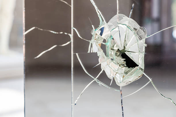 istock Glass wall fractured and broken 469408358