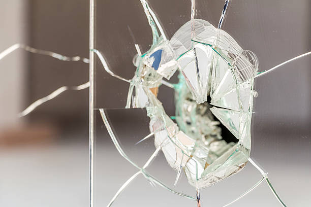 istock Glass wall fractured and broken 469408360