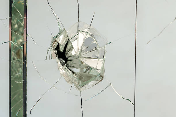 istock Glass wall fractured and broken 469408362