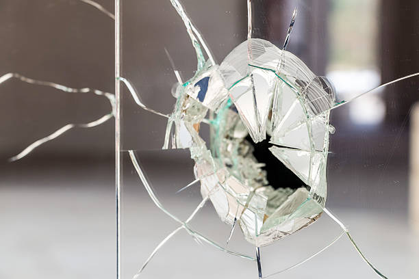 istock Glass wall fractured and broken 469408364