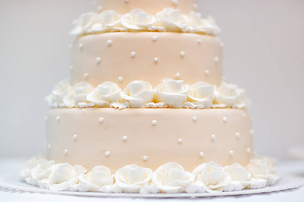 istock Delicious peach and white wedding cake 469408648