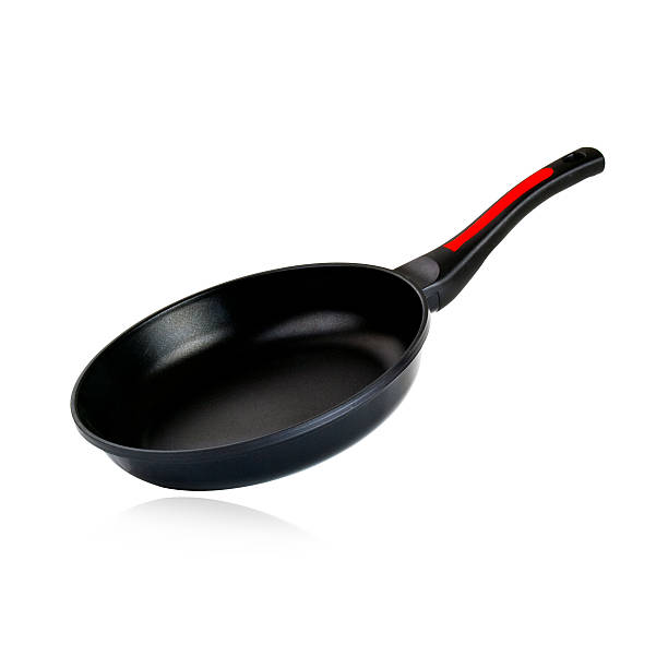 istock black frying pan isolated on white background 469408830