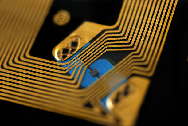 RFID chips and tags stock pictures of rfid tags used for tracking and identification purposes radio frequency identification stock pictures, royalty-free photos & images