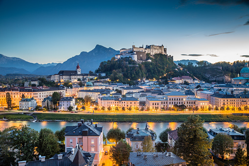 Historic city of Salzburg with Hohensalzburg Fortress at dusk, Salzburger Land, Austria.