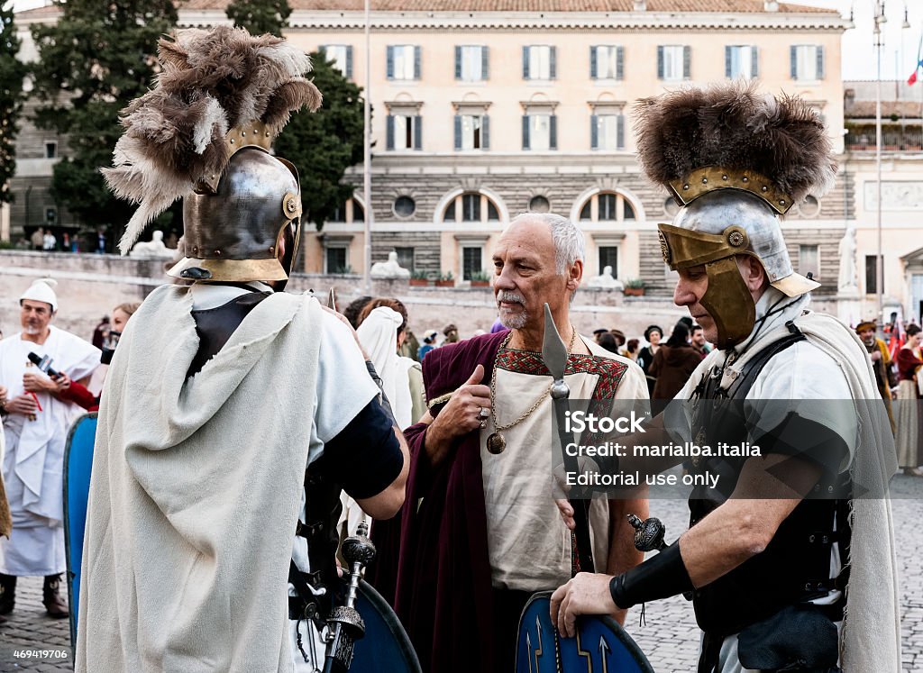 Senator and Legionaries Rome, Italy - February 17, 2015: A Senator and two legionaries waiting for the Carnevale Romano 2015's parade to begin.  Ancient Rome Stock Photo