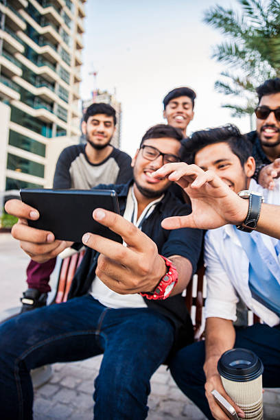 istock Friends taking a selfie in Dubai Marina during a vacation 469420402
