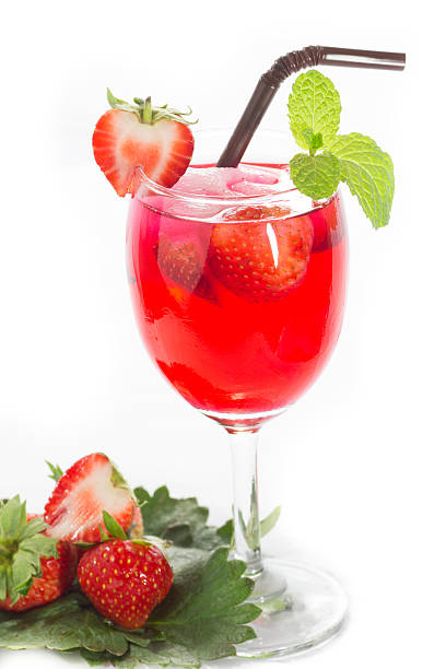 istock Fresh strawberry and juice glass isolated on white background 469420980