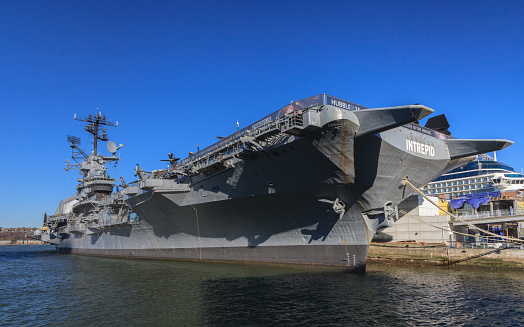 New York City, New York, USA - November 19, 2014:  Aircraft carrier USS Intrepid docked in New York City off the Hudson River.